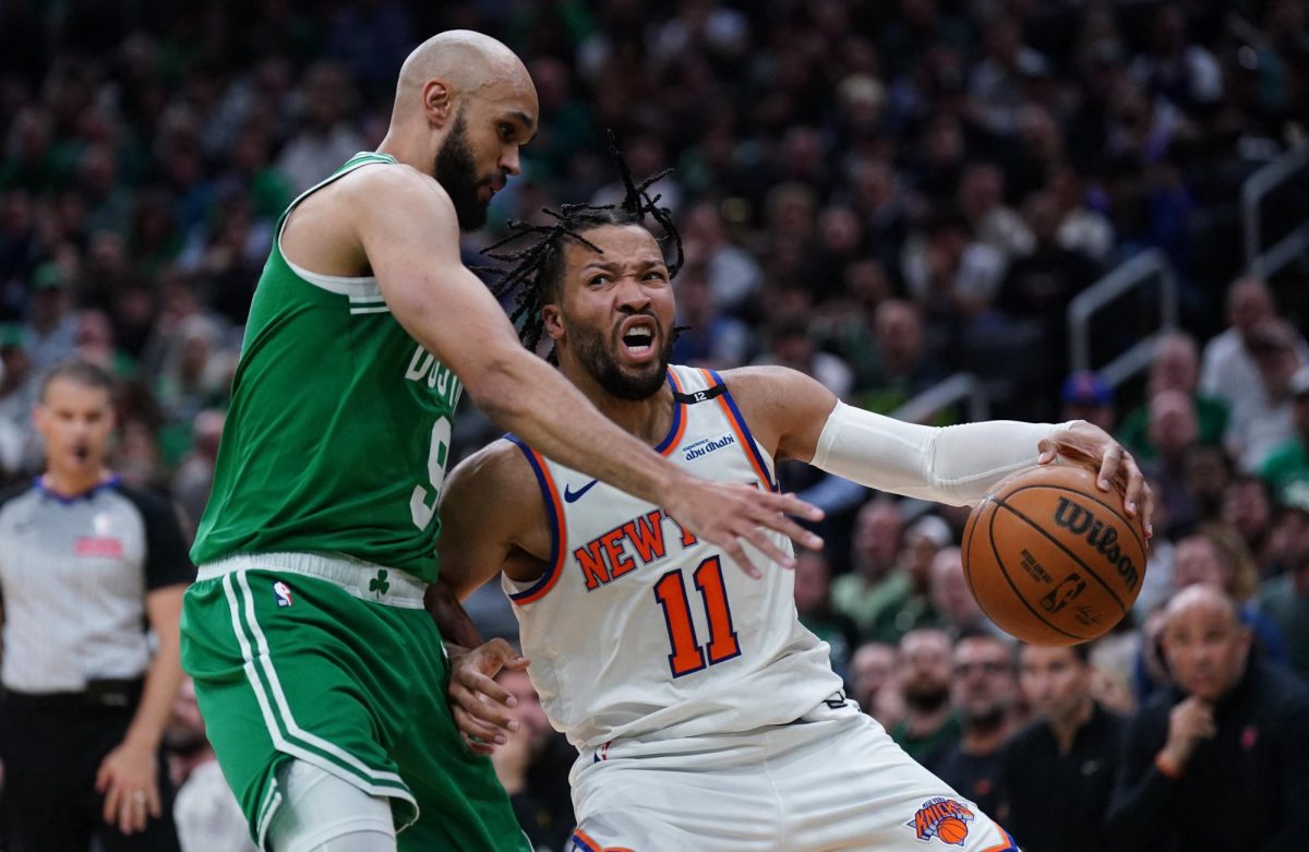 May 7, 2025; Boston, Massachusetts, USA; Boston Celtics guard Derrick White (9) defends against New York Knicks guard Jalen Brunson (11) in the second quarter during game two of the second round for the 2025 NBA Playoffs at TD Garden. Mandatory Credit: David Butler II-Imagn Images