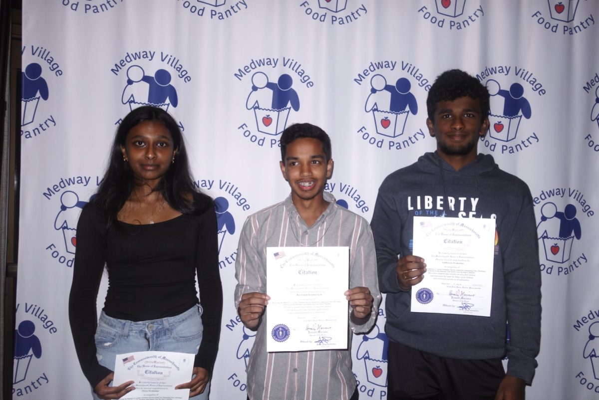 Oviya, Harshanth, and Aadhavan receiving the Marilyn H. Conley Volunteer Service Award.