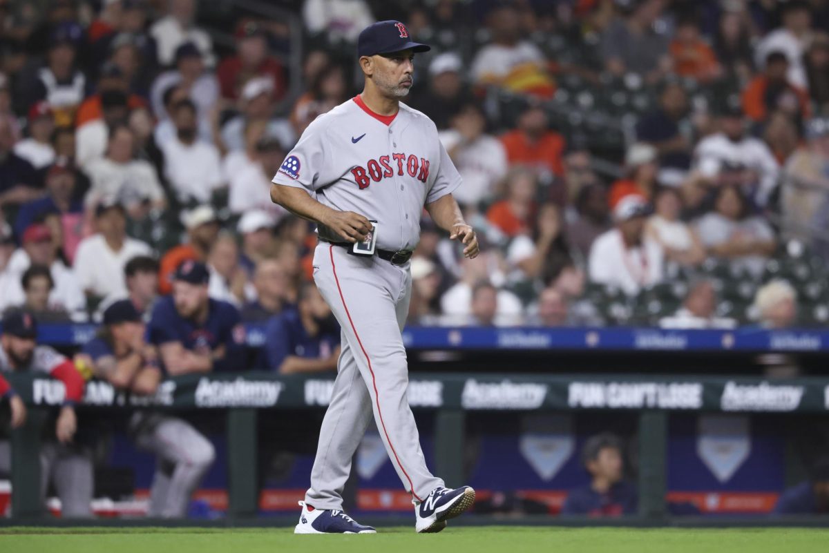 Mar 30, 2026; Houston, Texas, USA; Boston Red Sox manager Alex Cora walks to the mound for a pitching change during the fifth inning against the Houston Astros at Daikin Park. Mandatory Credit: Troy Taormina-Imagn Images
